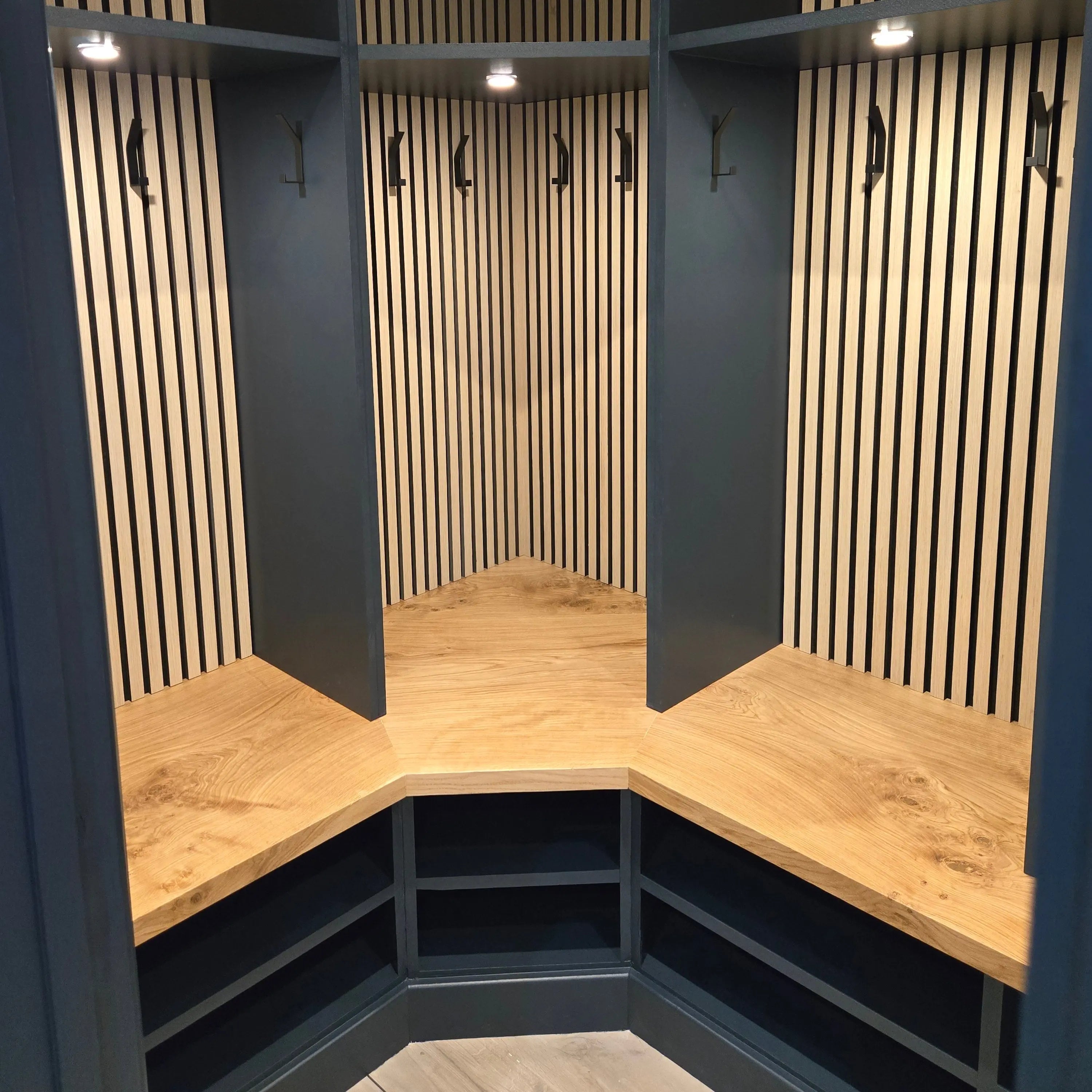 Wooden and black storage unit with slatted design