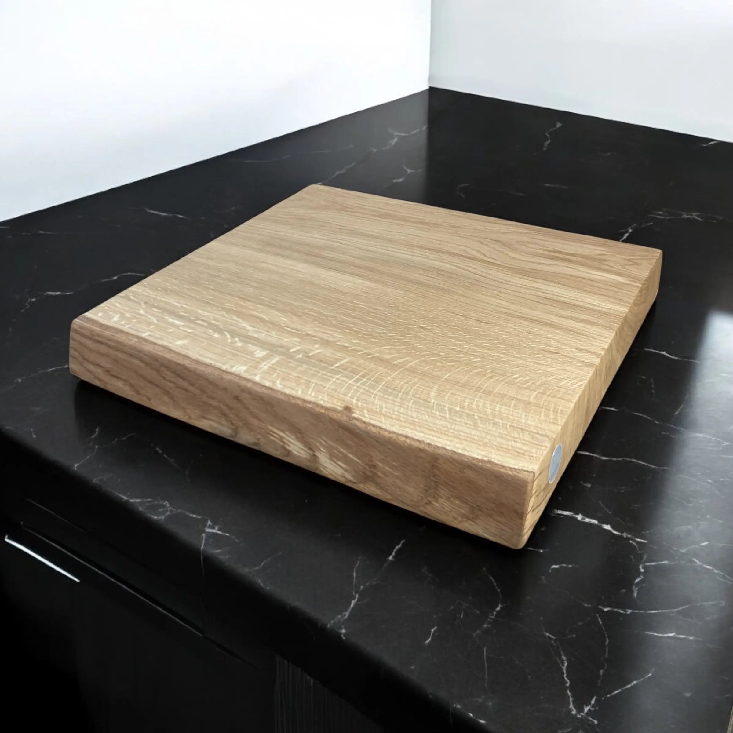 solid oak chopping board black counter top
