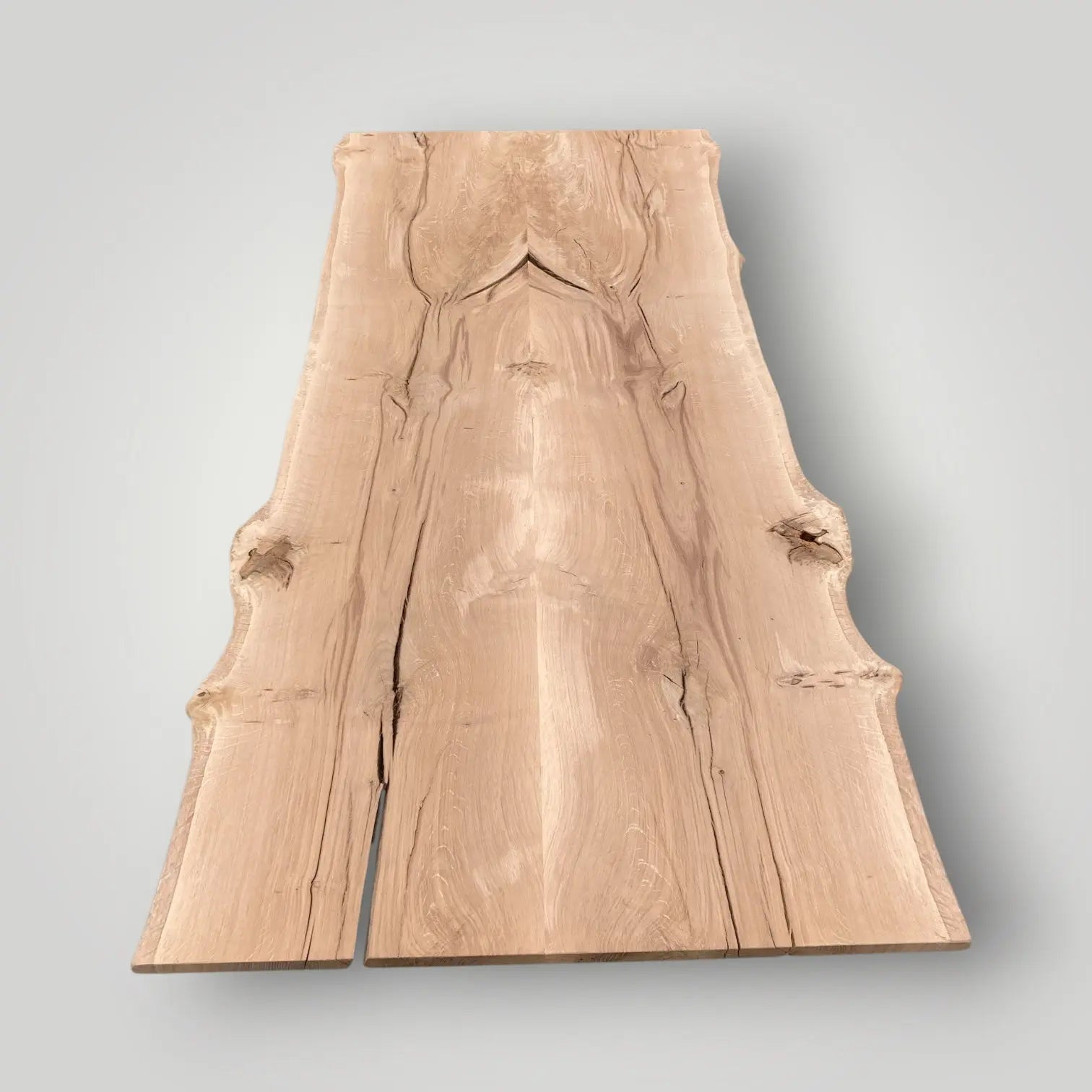 Wooden slab with natural grain and texture on a gray background