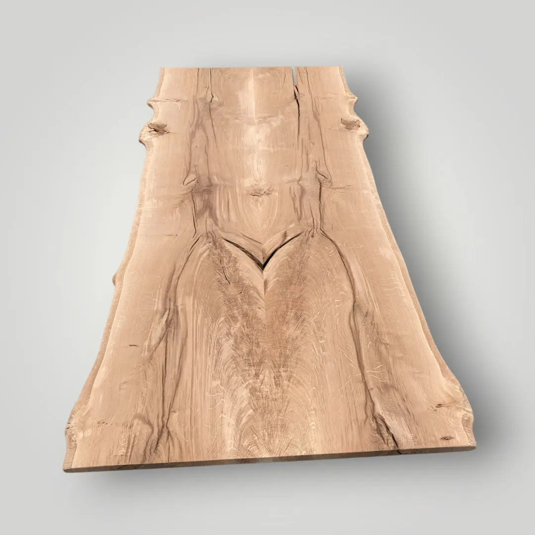 Wooden oak table top with a textured surface on a gray background