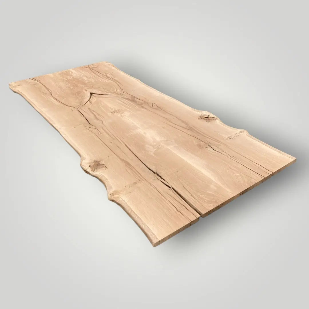 Raw wooden slab on a light gray background