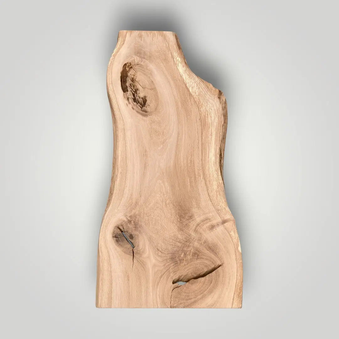 Wooden slab with natural grain and texture on a gray background