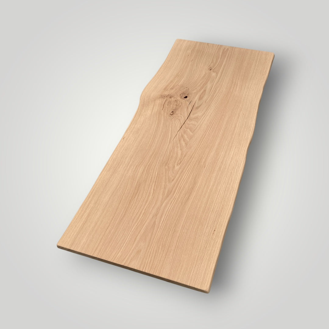 Wooden cutting board on a light gray background