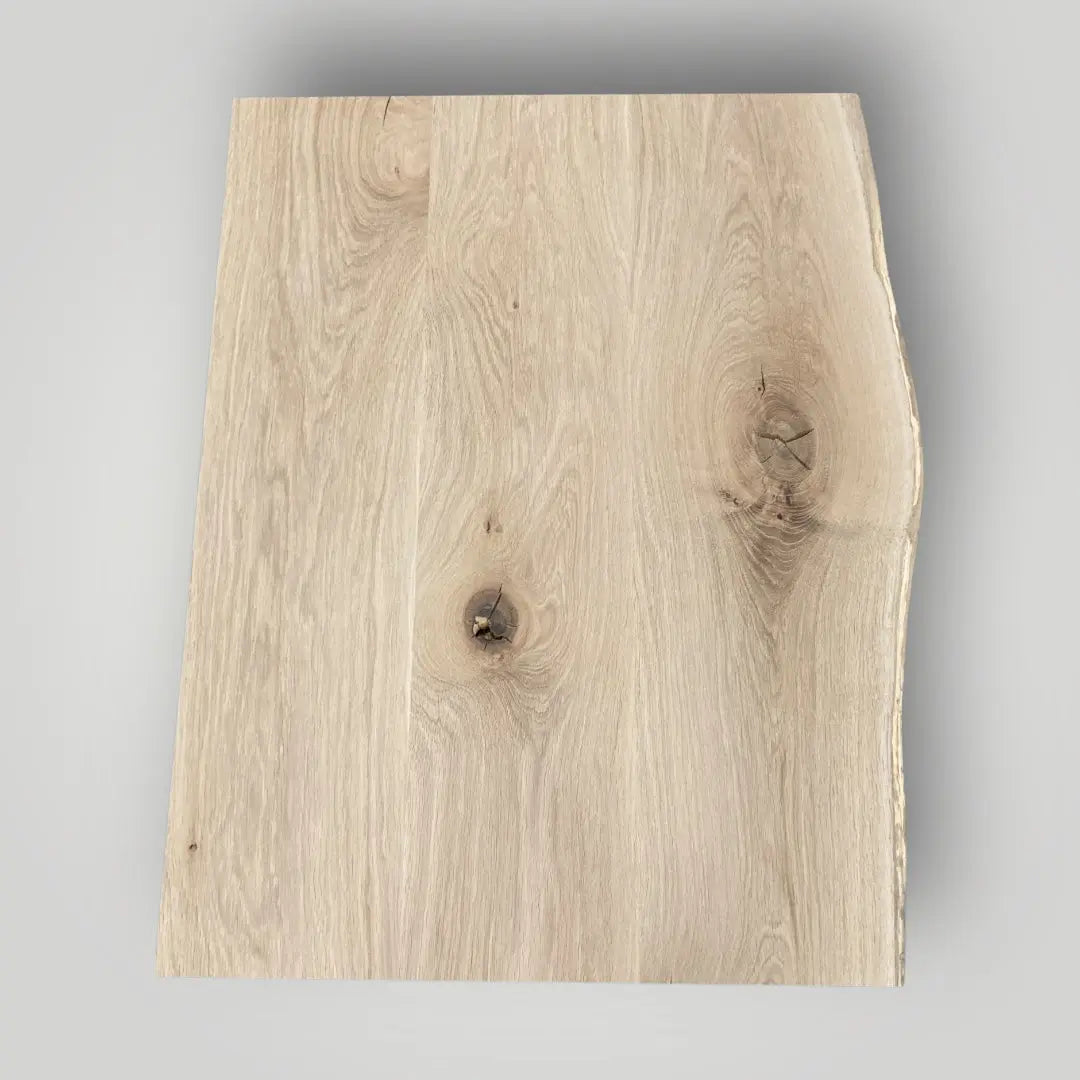 Wooden board with a natural finish on a gray background 1