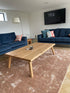 oak guys coffee table - blue sofas
