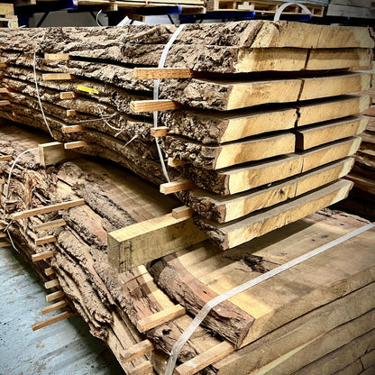 Stack of wooden planks tied together in a warehouse setting