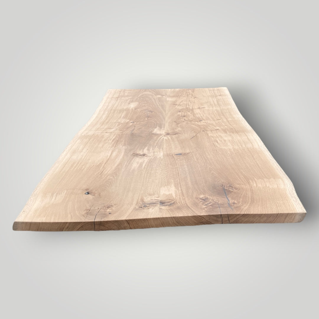 Wooden cutting board on a light gray background