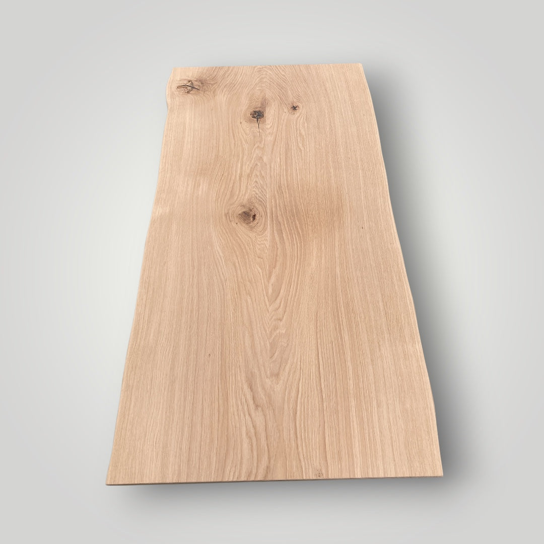 Plain wooden board on a gray background