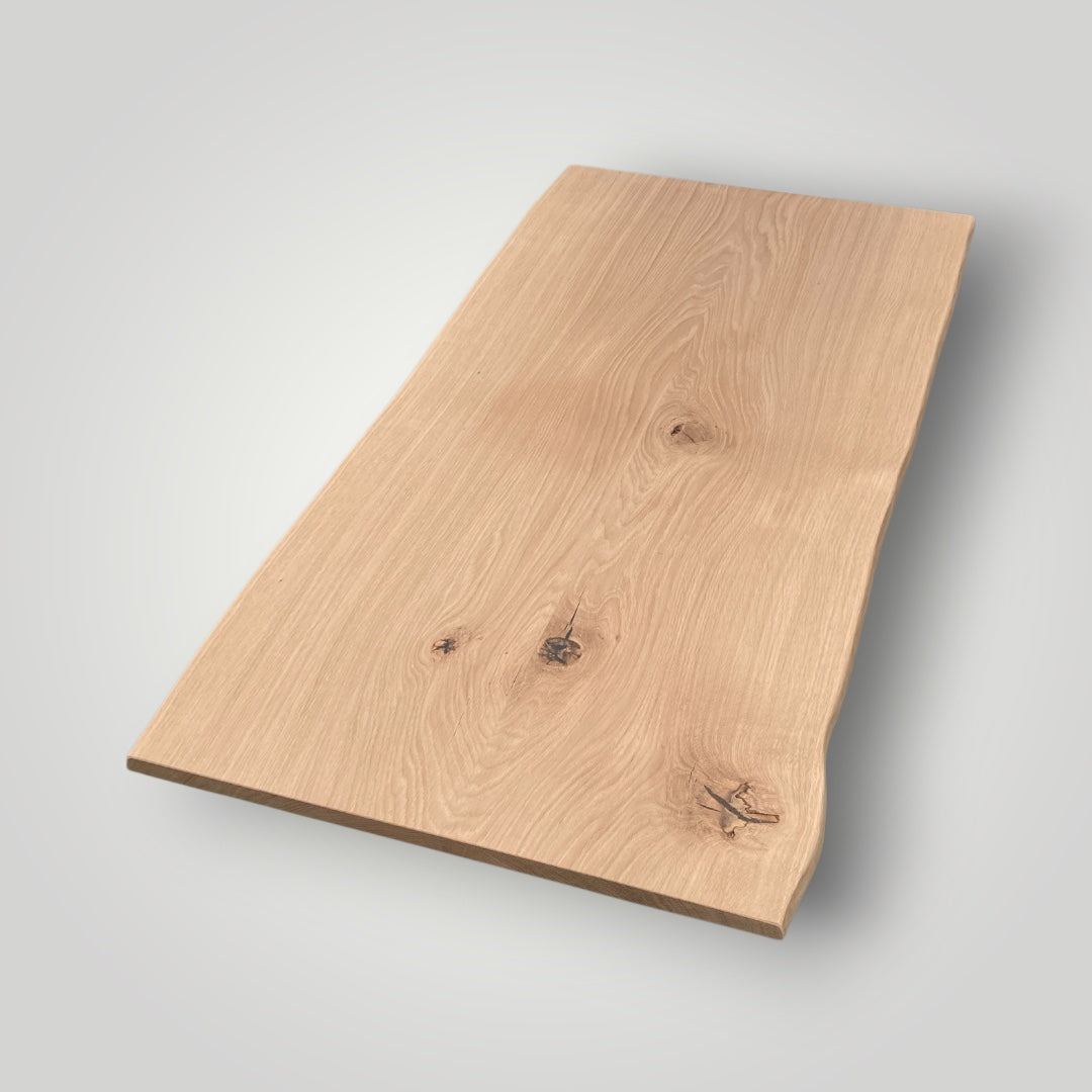 Wooden cutting board on a light gray background