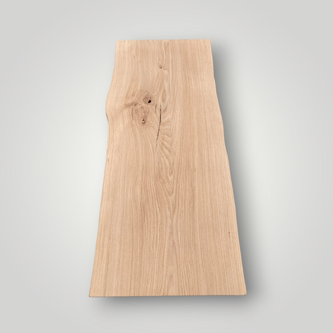 Plain wooden board on a gray background