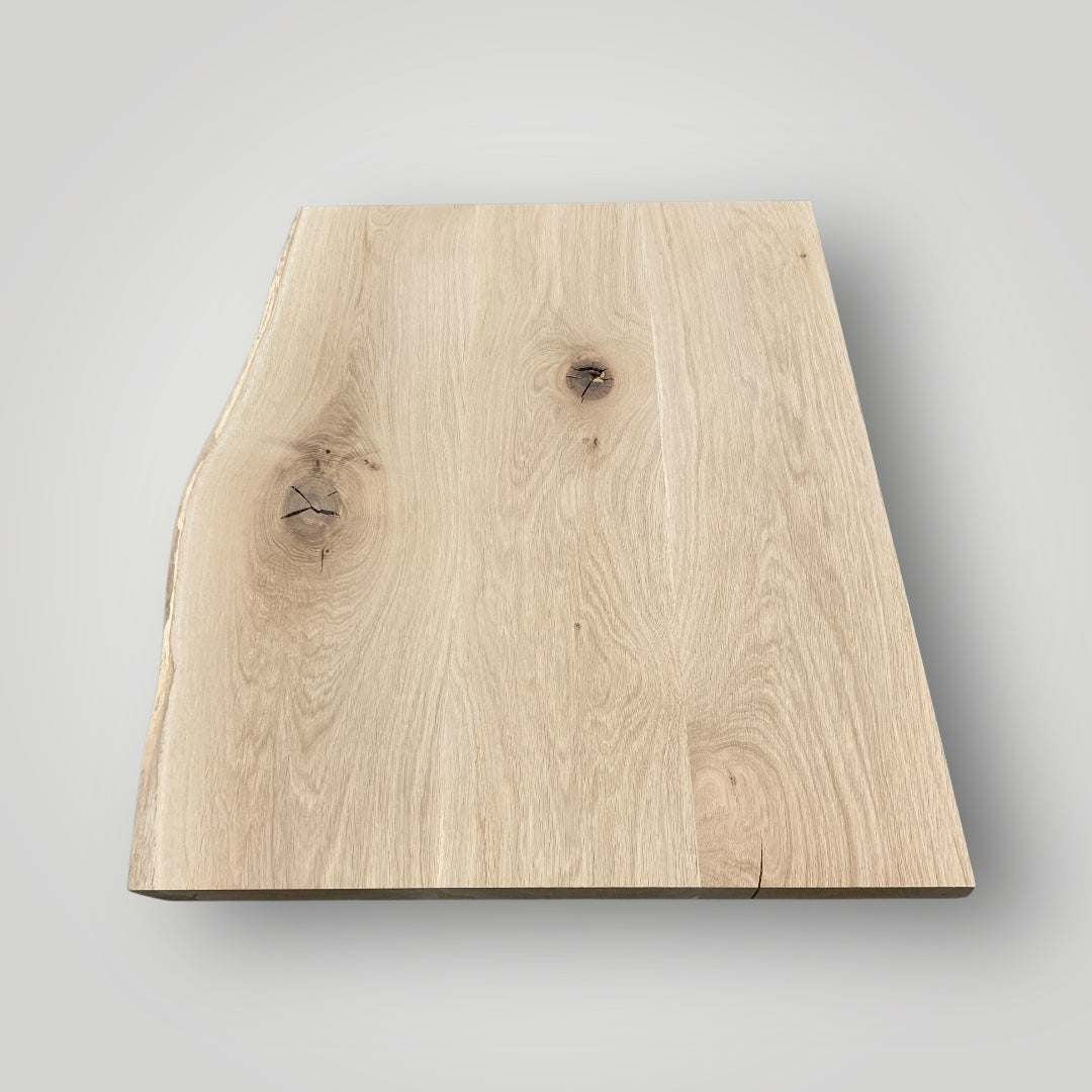 Raw wooden slab on a gray background