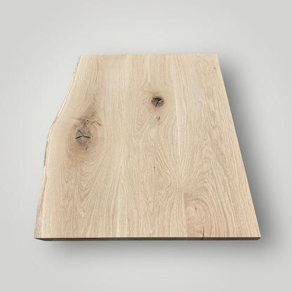 Raw wooden slab on a gray background